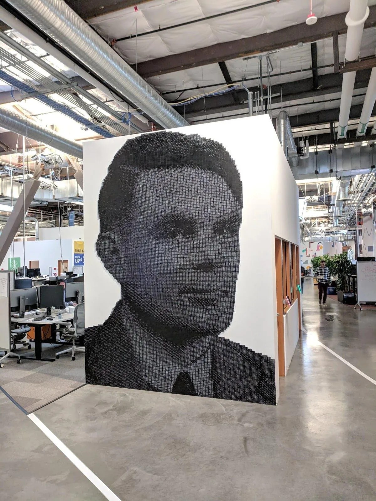 A mural of Alan Turing made out of dominoes at Facebook’s headquarters