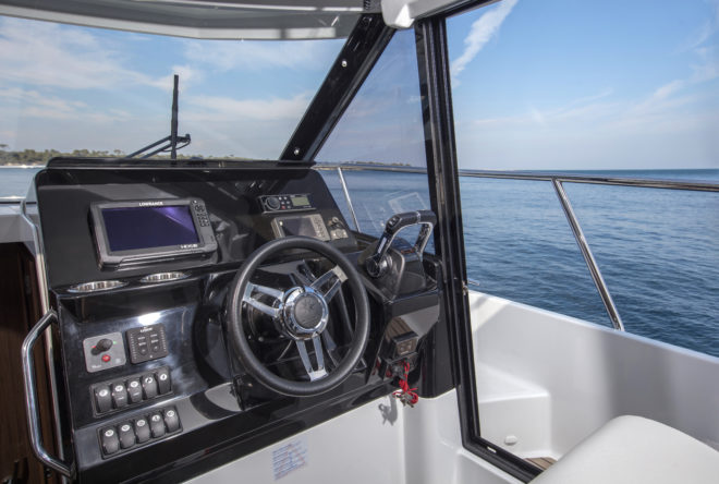 The Jeanneau Merry Fisher 1095’s helm station has side deck access