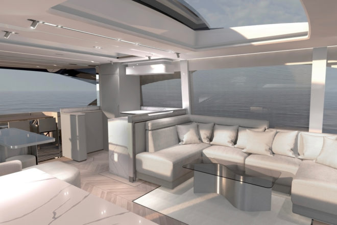 The saloon features an aft galley to port opposite an L-shaped sofa and dining table