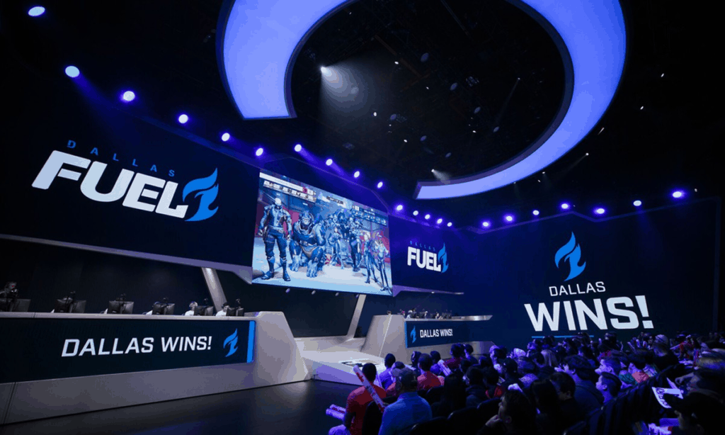 The crowd watches a Dallas Fuel game, live on stage.