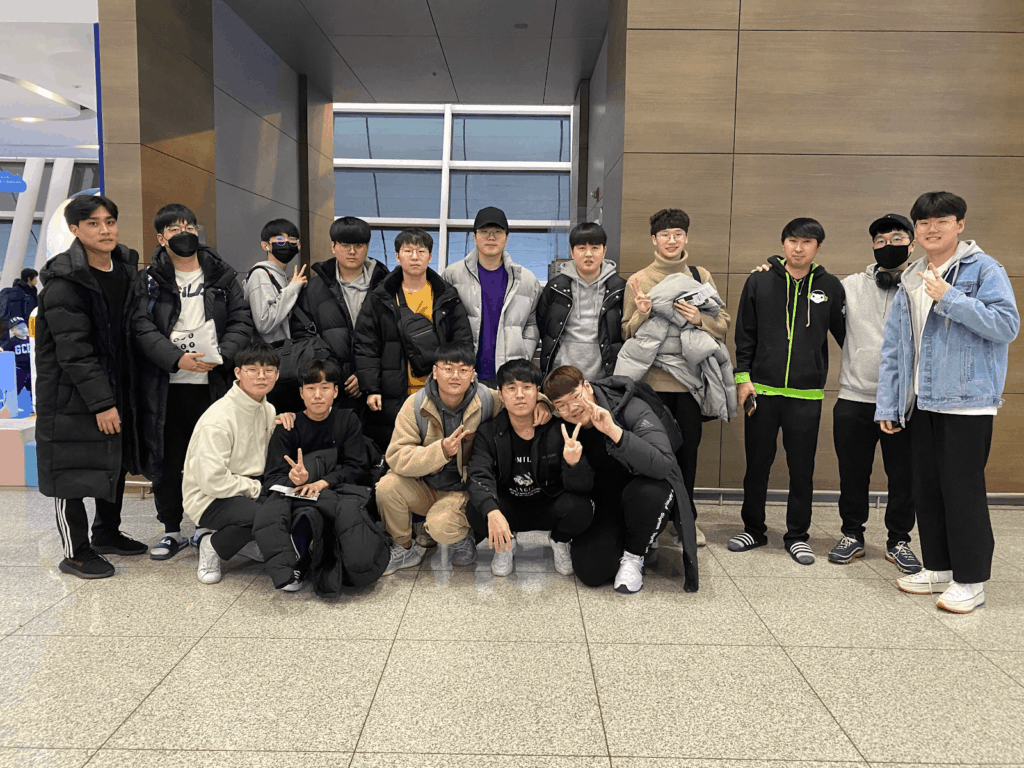 The London Spitfire pose together at the airport ahead of flying out to New York