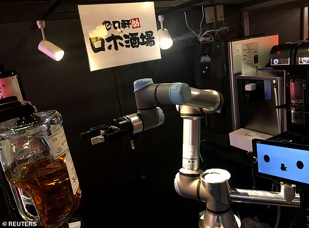 The Zeroken Robo Tavern in Tokyo's bustling Ikebukuro Station has a robot bartender that can serve draft beer, sake, and mixed drinks