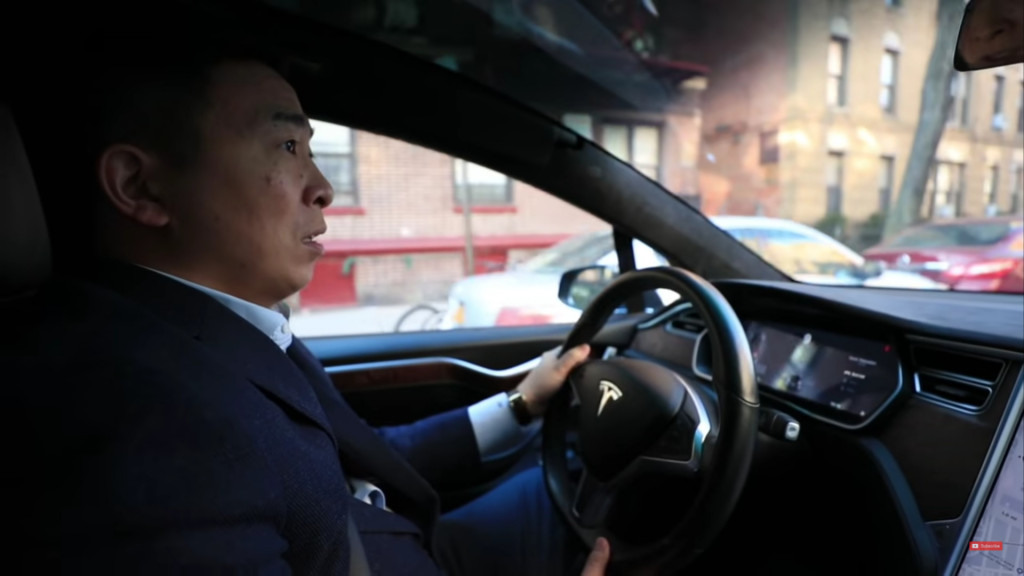 Presidential candidate Andrew Yang with Tesla Model X