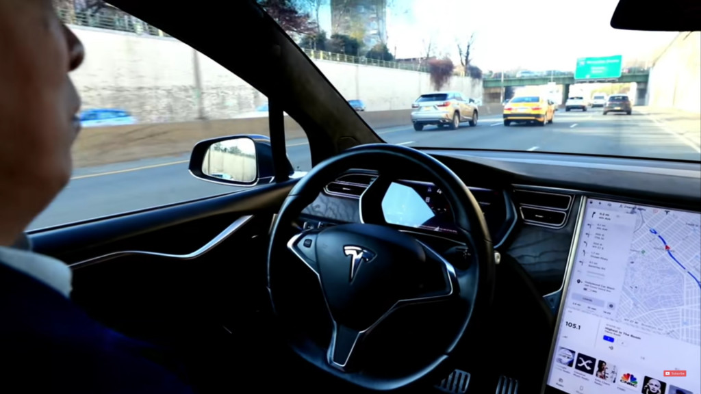 Presidential candidate Andrew Yang with Tesla Model X