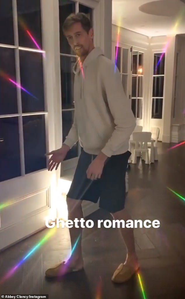 It's back: Peter Crouch recreated his famous dance move as he larked around at home with wife Abbey Clancy as he marked his 39th birthday on Thursday