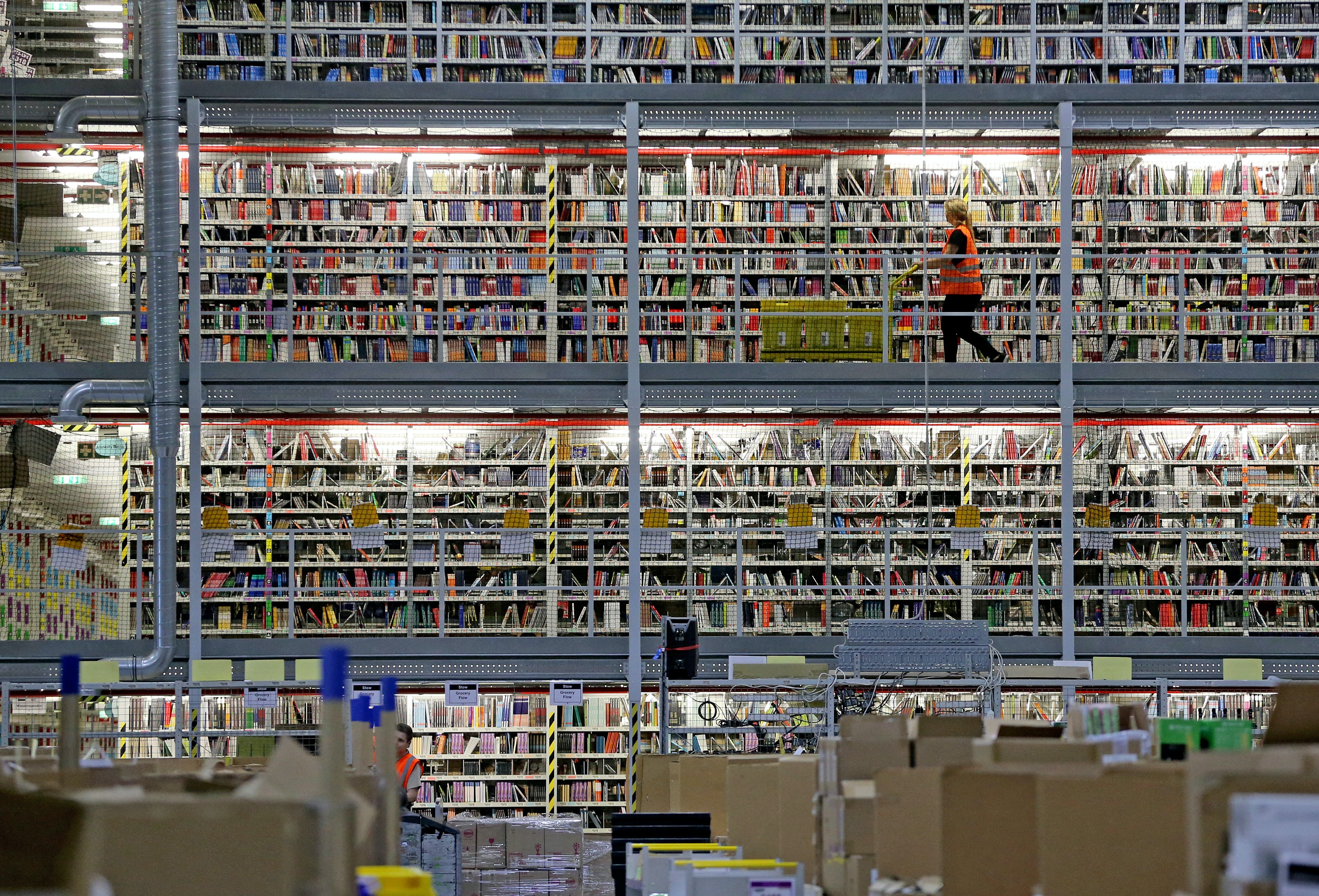 The scene inside an Amazon warehouse.