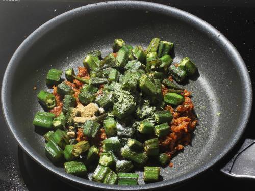 adding okra to masala